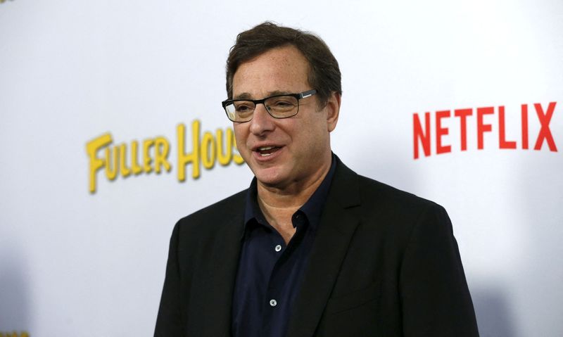 FILE PHOTO: Cast member Saget poses at the premiere for