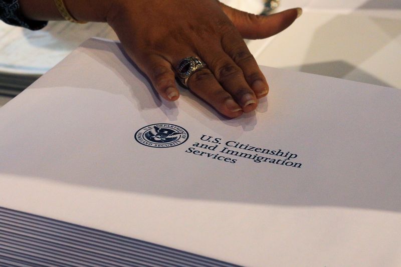 FILE PHOTO: Information packs are distributed by the U.S. Citizenship