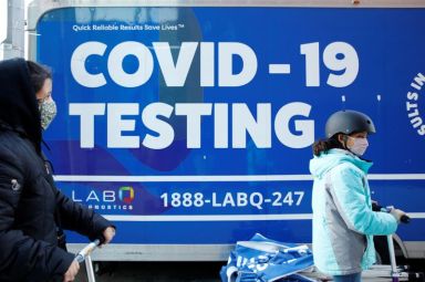 Children are seen outside a coronavirus disease (COVID-19) testing site