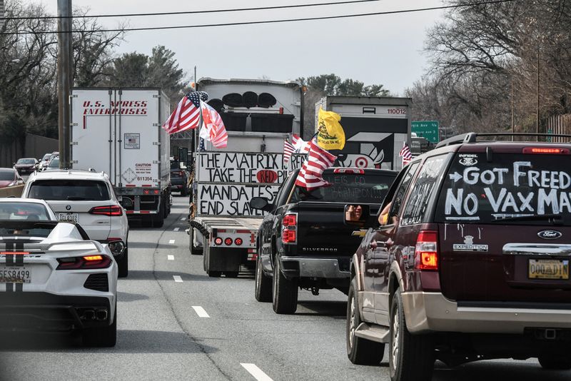 FILE PHOTO: Truckers and their supporters drive towards Washington, in