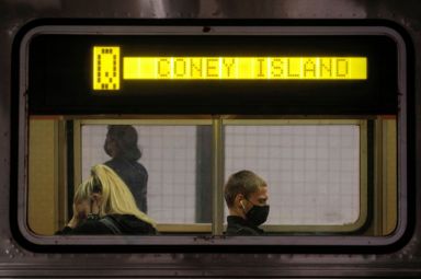 FILE PHOTO: Passengers ride aboard the MTA’s New York City