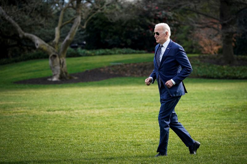 FILE PHOTO: U.S. President Biden walks to board Marine One