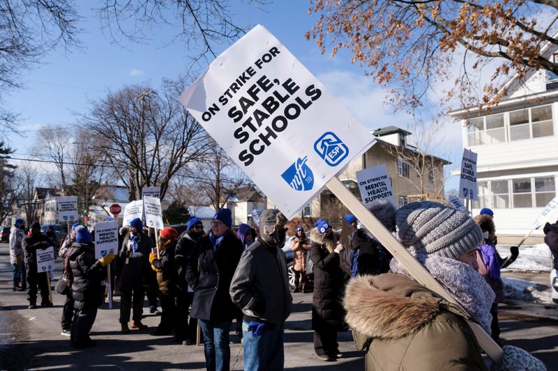Striking Minneapolis teachers picket outside of closed schools