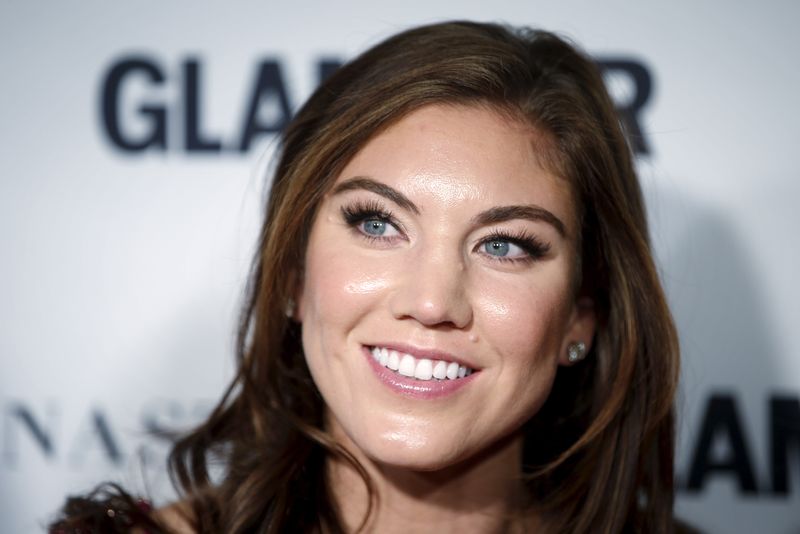 Soccer player Hope Solo arrives for the “Glamour Women of