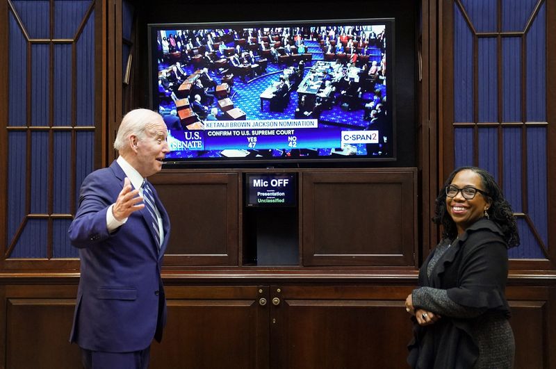 U.S. President Joe Biden watches as the full U.S. Senate