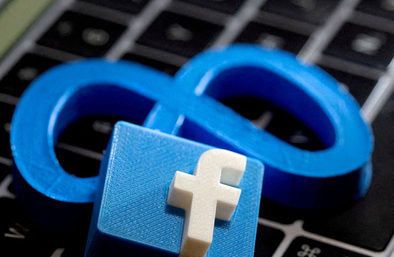 FILE PHOTO: 3D-printed images of the logos of Facebook and