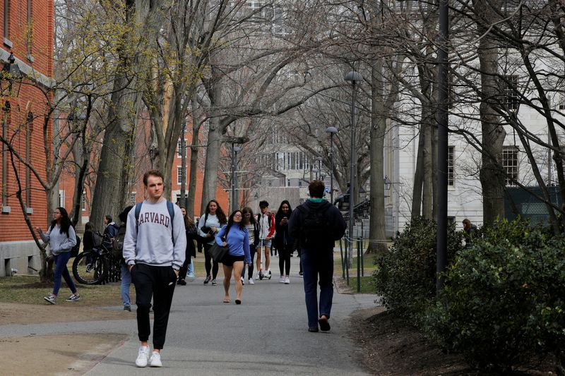 FILE PHOTO: Students and pedestrians walk through the Yard at