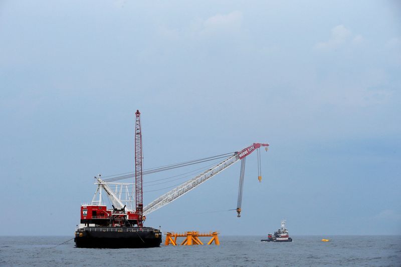 FILE PHOTO: Crane hangs over the first jacket installed to