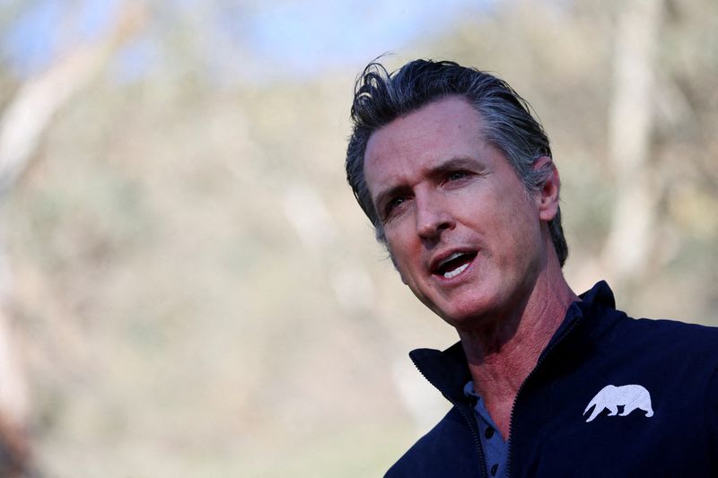 FILE PHOTO: California Governor Gavin Newsom delivers remarks as he