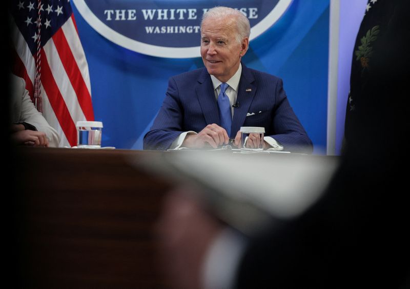 FILE PHOTO – U.S. President Joe Biden meets with small
