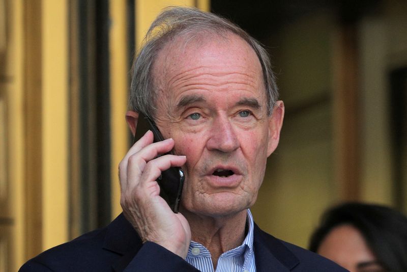 FILE PHOTO: Lawyer David Boies speaks on the phone after