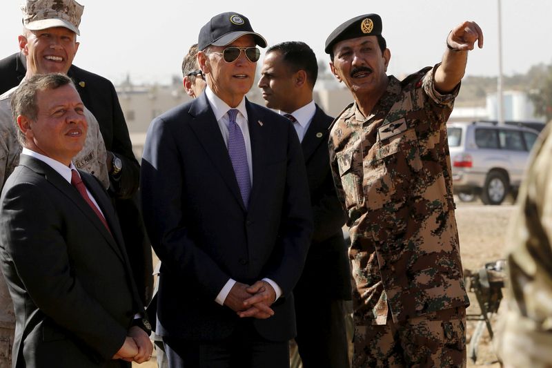 FILE PHOTO: Jordan’s King Abdullah and U.S. Vice President Joe