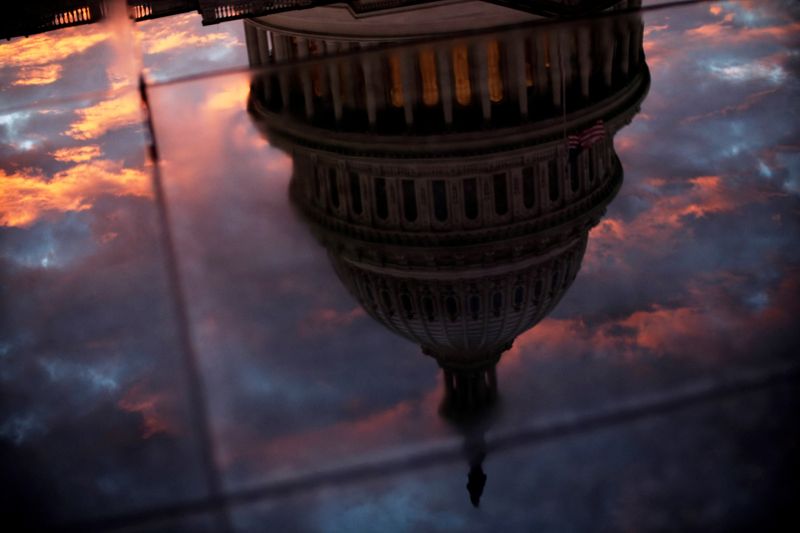 FILE PHOTO: The U.S. Capitol dome is reflected in the