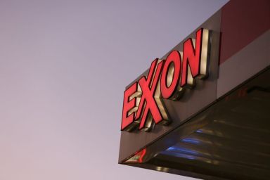 Signage is seen at an Exxon gas station in Brooklyn,
