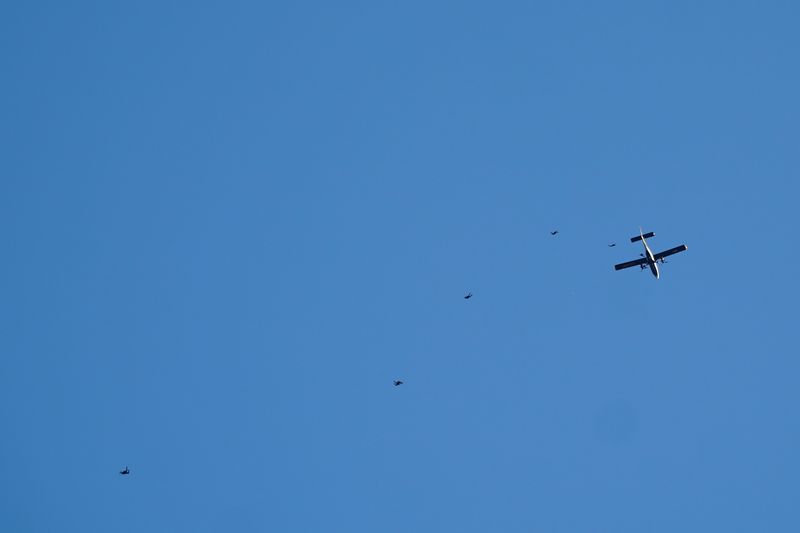 Plane and parachutists at baseball game spark security scare at