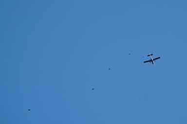 Plane and parachutists at baseball game spark security scare at