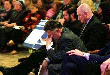 FILE PHOTO: Former Columbine principal DeAngelis cries as he is