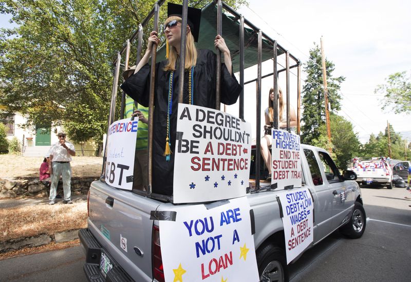 FILE PHOTO: Parade participants protesting against high student loan burdens