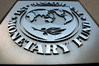 The IMF logo is seen outside the headquarters building in