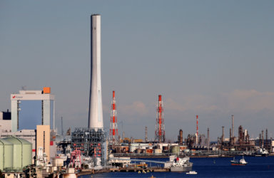 Chimneys are seen at an industrial area in Yokohama