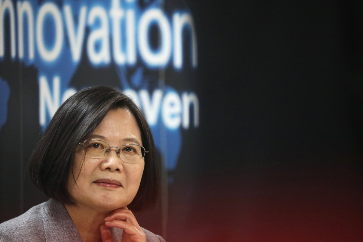 Taiwanese president Tsai Ing-Wen listens to a presentation at a