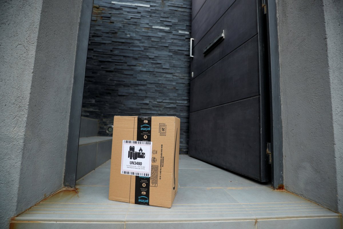 FILE PHOTO: An Amazon package is delivered and left at