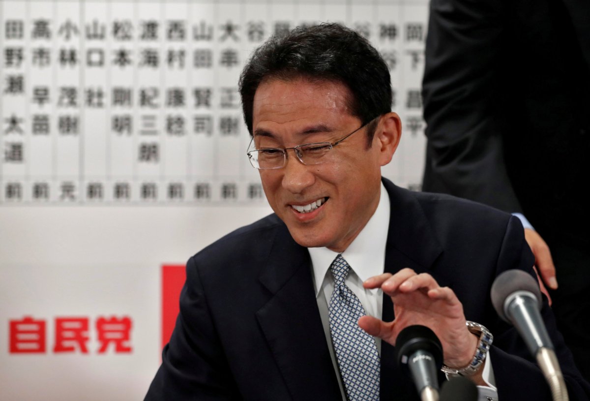 Japan’s ruling Liberal Democratic Party policy chief Fumio Kishida smiles