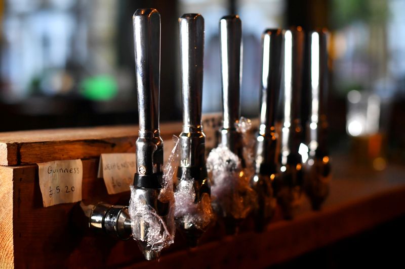 FILE PHOTO: Some beer taps are covered at The Prince