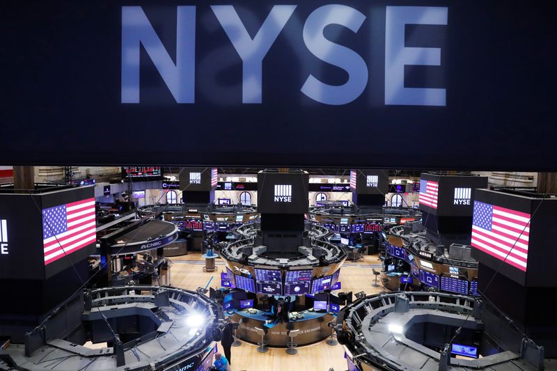 The floor of the New York Stock Exchange (NYSE) stands
