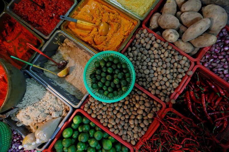 Spices and local produce to sell are seen at a