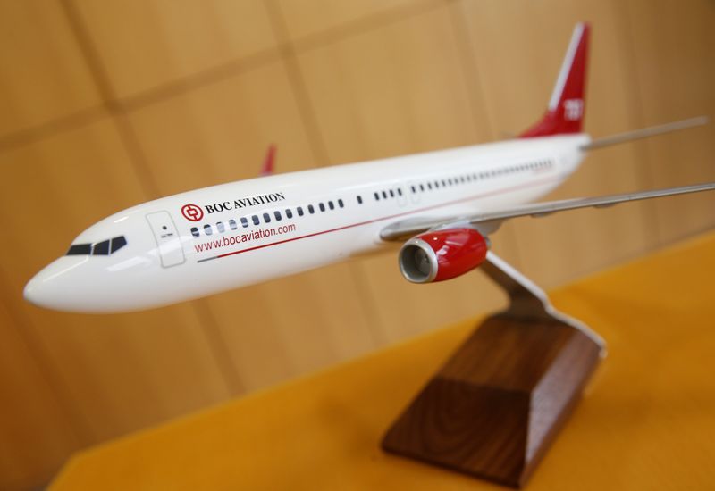 A photo illustration of a BoC Aviation model plane at