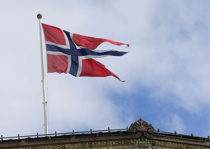 FILE PHOTO: Norwegian flag flutters over building in Oslo