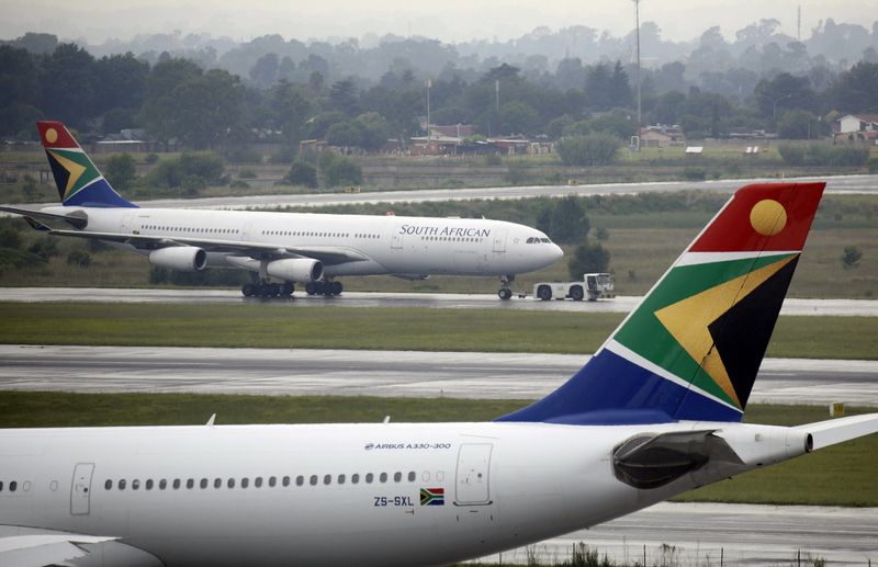 FILE PHOTO: A South African Airways (SAA) plane is towed