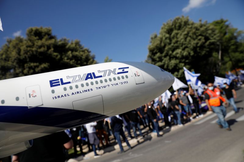 Employees of Israeli flag carrier El Al Airlines take part