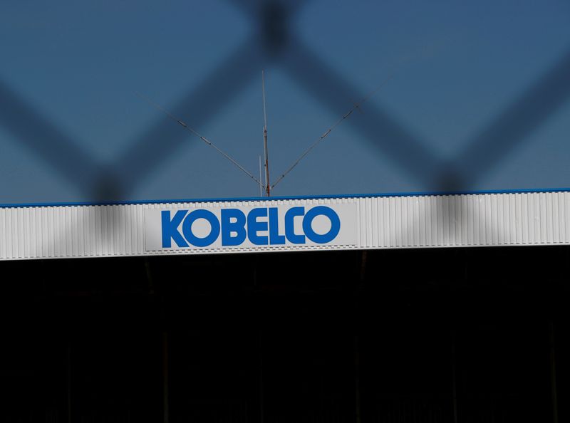 Kobe Steel’s logo is seen through a fence at a