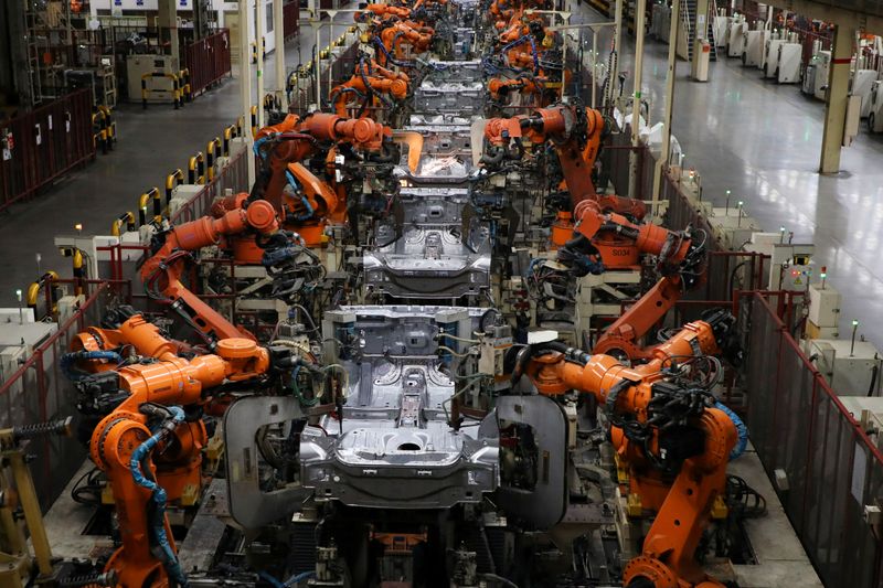 Robots weld bodyshells of car are pictured on the assembly