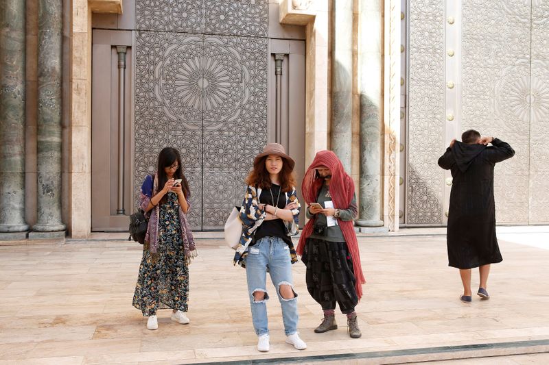 FILE PHOTO: Chinese tourists visit the Hassan II Mosque in