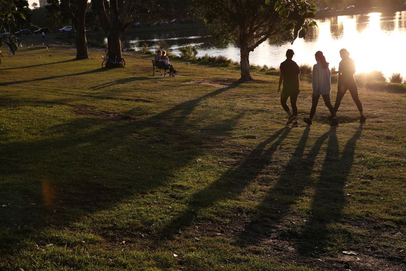 People exercise in Centennial Park in Sydney