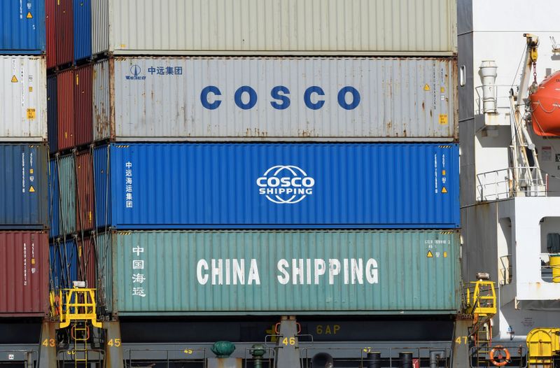 FILE PHOTO: Containers of Chinese companies China Shipping and COSCO