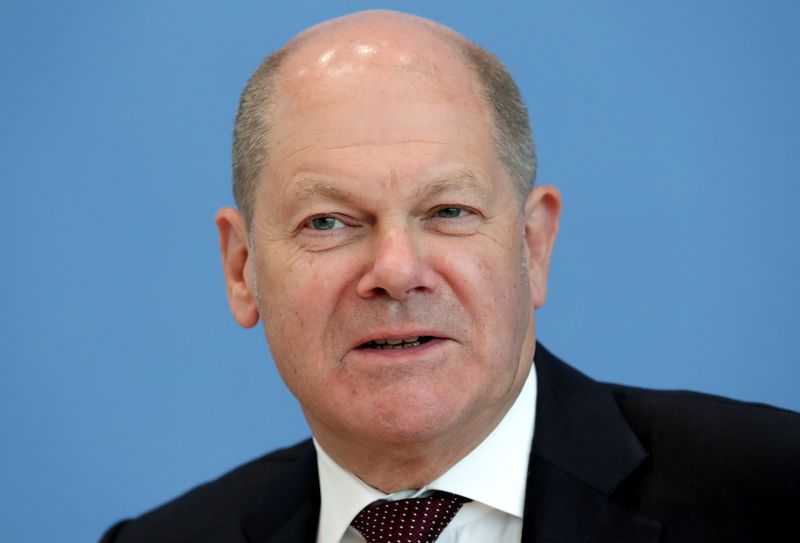 German Finance Minister Olaf Scholz attends a news conference in