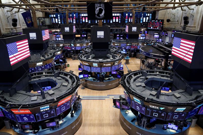 The floor of the New York Stock Exchange (NYSE) stands