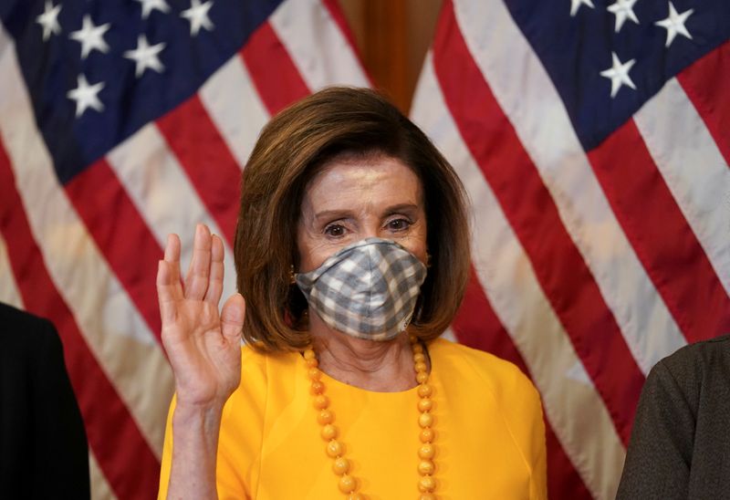 Speaker of the House Nancy Pelosi wears a mask in