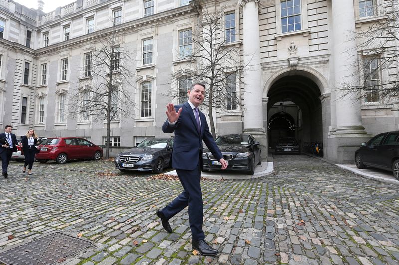FILE PHOTO: Irish Finance Minister Paschal Donohoe walks outside Government