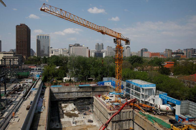 A crane is seen at a construction site in Beijing