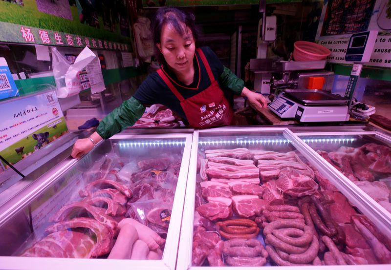 FILE PHOTO: Pork for sale is seen at Sanyuanli market