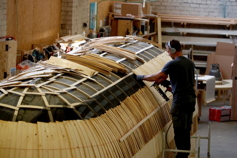 Iglucraft comapany worker makes a roof of the Iglusaun sauna