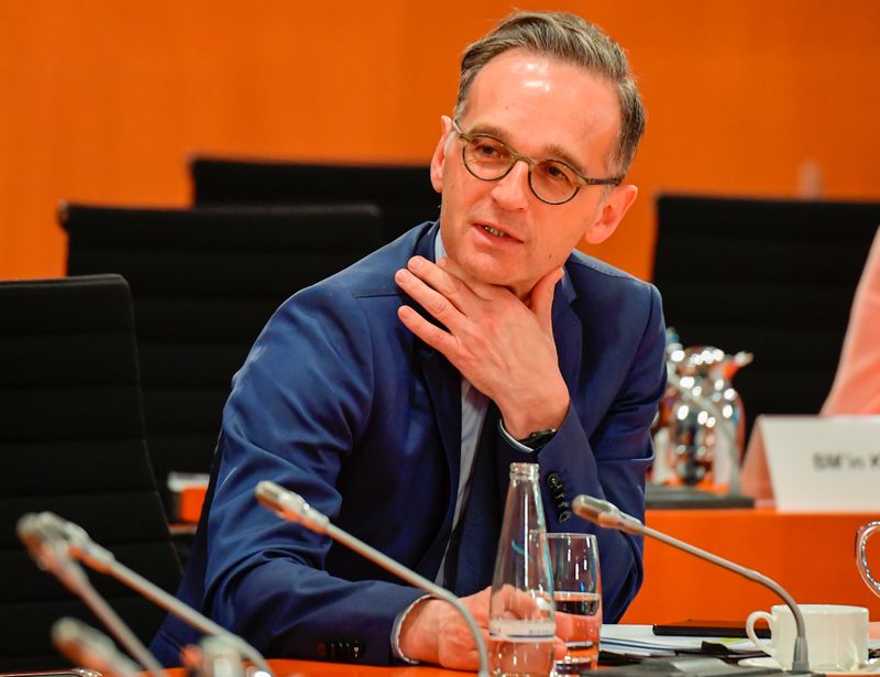 German Foreign Minister Heiko Maas gestures at the weekly cabinet