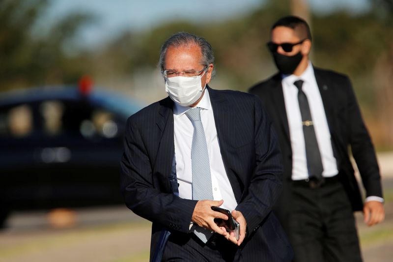 FILE PHOTO:  Brazil’s Economy Minister Paulo Guedes walks before