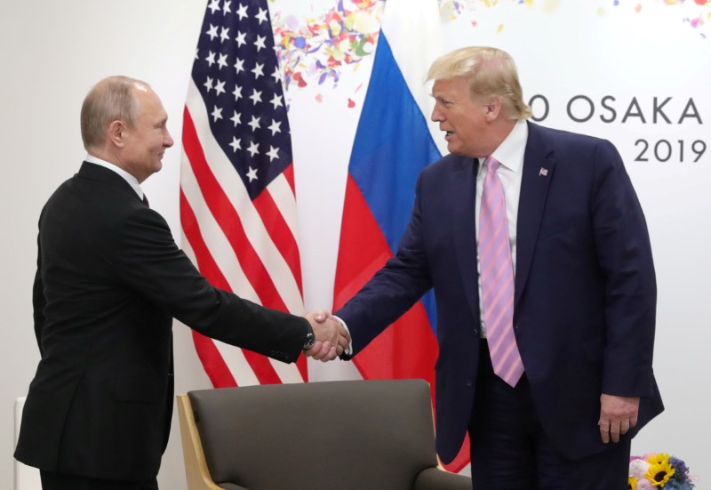 FILE PHOTO: Russia’s President Vladimir Putin and U.S. President Donald