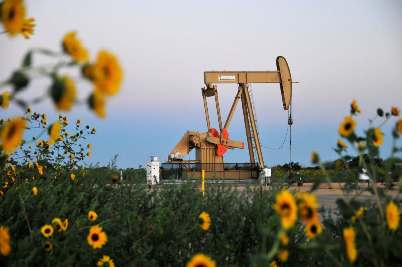 FILE PHOTO: A pump jack operates at a well site